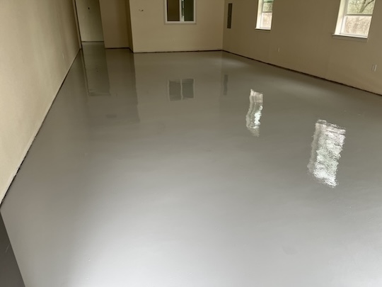 Grey poxy and urethane shop floor coating.